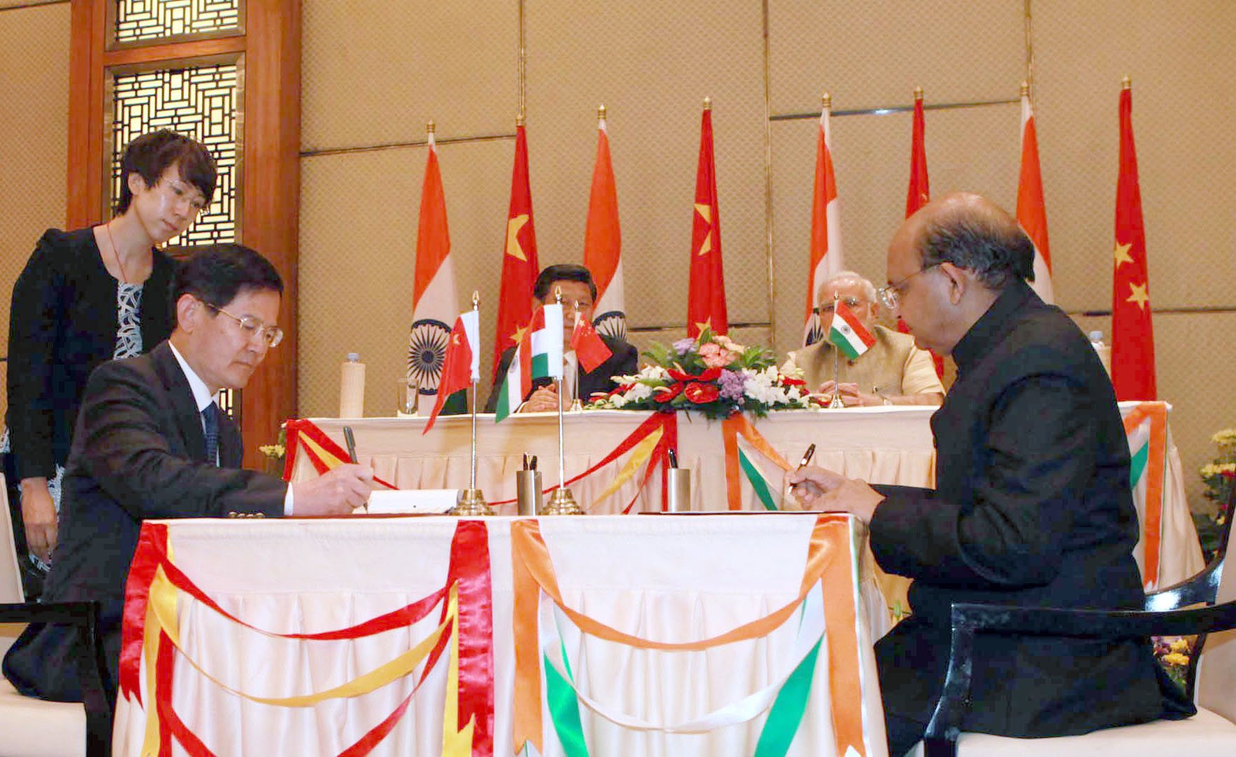 PM modi and Chinese President Xi Jinping witness signing of 3 MoUs in Ahmedabad