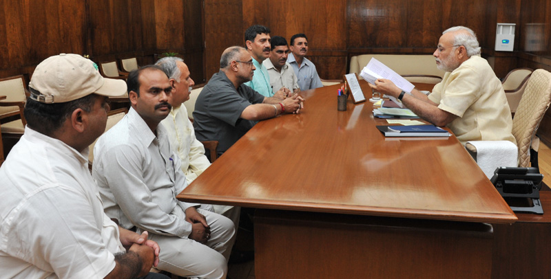 MP Jugal Kishore Sharma, accompanied by a delegation of West Pakistan refugees, calls on the PM Narendra Modi